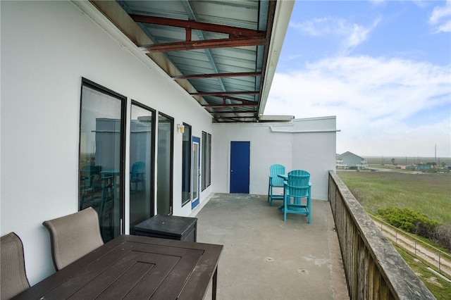 balcony featuring a patio area