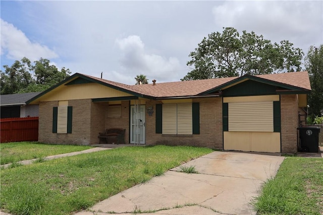 1905 Loritte Dr, Corpus Christi, TX 78416 - ranch-style house featuring brick siding and concrete driveway