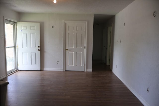 1905 Loritte Dr, Corpus Christi, TX 78416 - spare room featuring wood finished floors and baseboards