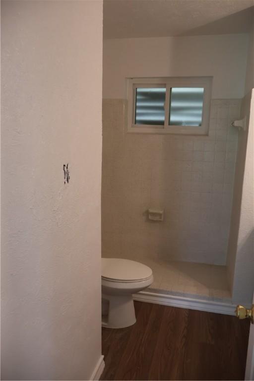 1905 Loritte Dr, Corpus Christi, TX 78416 - full bath with a stall shower and wood finished floors