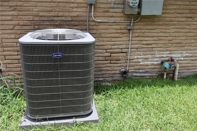 1905 Loritte Dr, Corpus Christi, TX 78416 - exterior view of a central air condition unit and brick siding