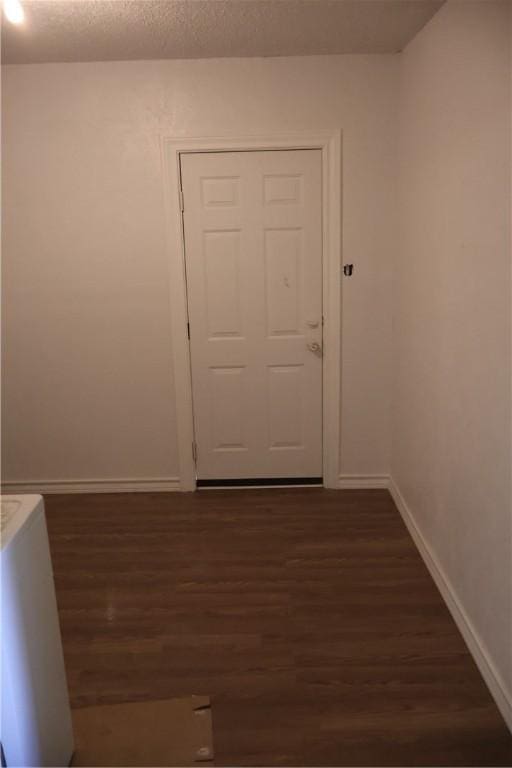 1905 Loritte Dr, Corpus Christi, TX 78416 - spare room with baseboards and dark wood finished floors