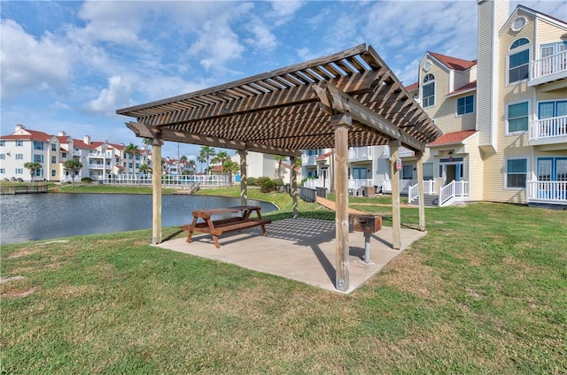 view of community with a patio, a water view, a lawn, a pergola, and a residential view