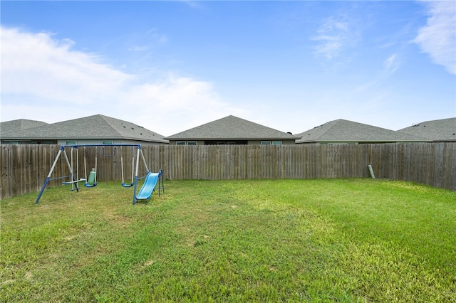 view of yard with a playground