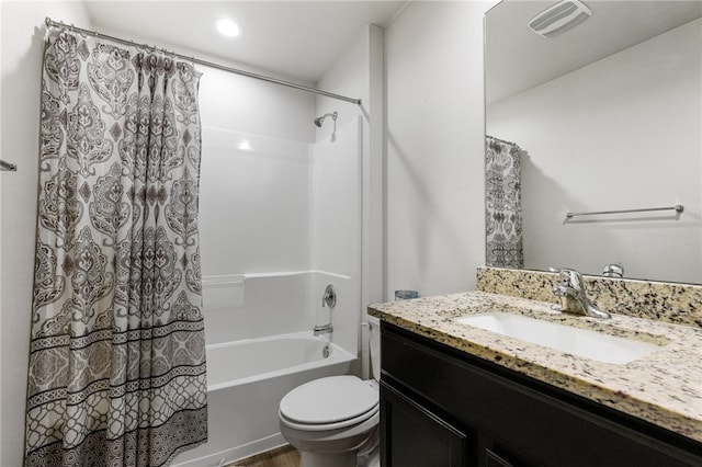 full bathroom with toilet, vanity, hardwood / wood-style floors, and shower / bathtub combination with curtain