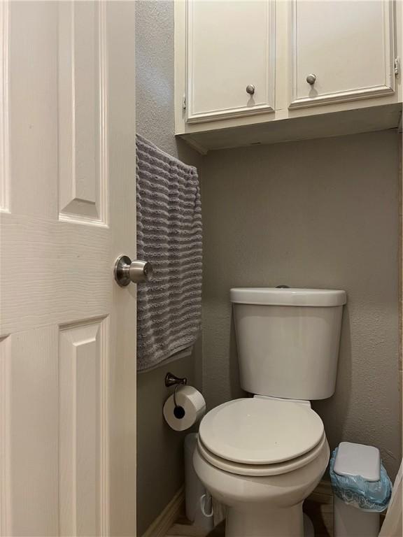 bathroom featuring toilet