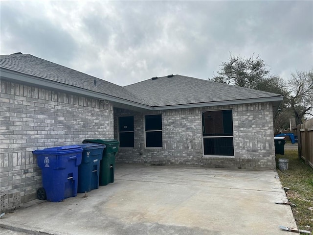 back of house with a patio area