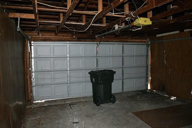 garage featuring a garage door opener