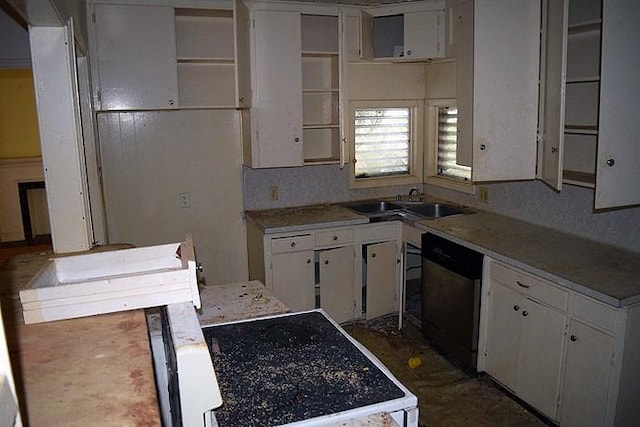 kitchen featuring sink, white cabinetry, decorative backsplash, and dishwasher