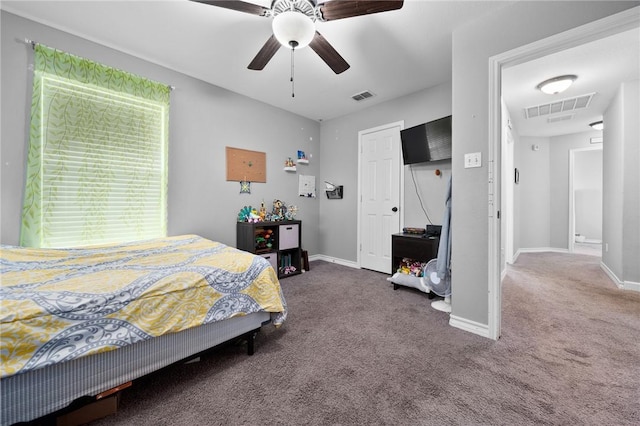 carpeted bedroom featuring ceiling fan