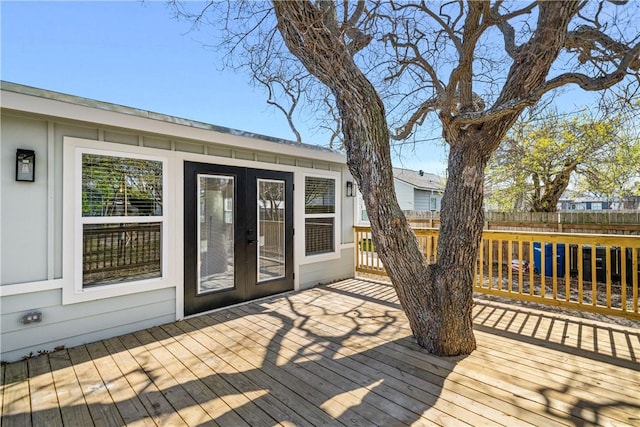 wooden deck with french doors and fence