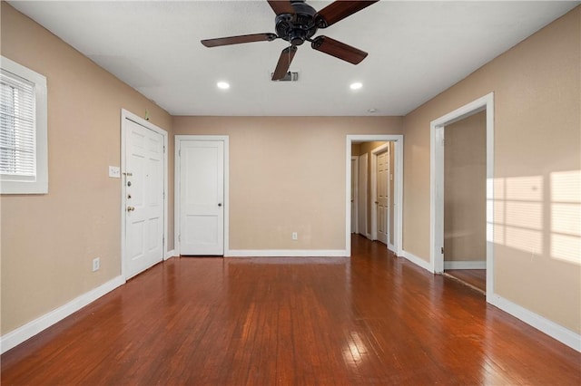 unfurnished room featuring hardwood / wood-style floors and ceiling fan