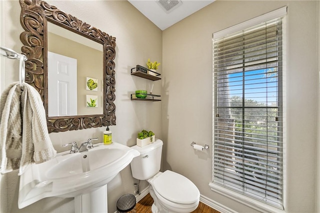 7217 Dunns Point Dr, Corpus Christi, TX 78414 - bathroom featuring toilet and wood finished floors