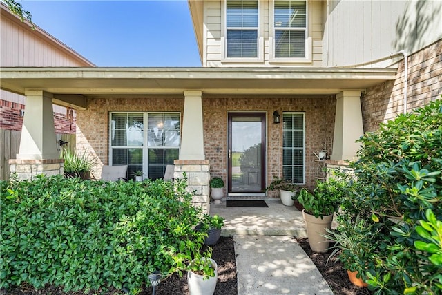 7217 Dunns Point Dr, Corpus Christi, TX 78414 - entrance to property with a porch and brick siding