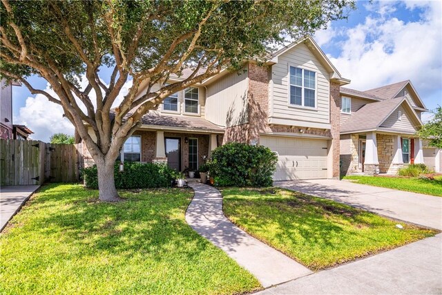 7217 Dunns Point Dr, Corpus Christi, TX 78414 - view of front facade featuring an attached garage, driveway, and brick siding