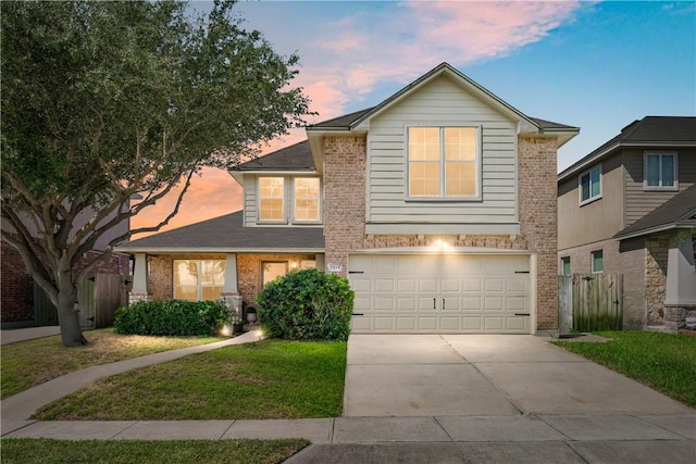 7217 Dunns Point Dr, Corpus Christi, TX 78414 - traditional-style home featuring brick siding, driveway, and a garage
