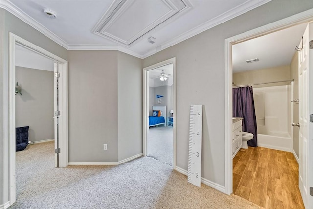 7217 Dunns Point Dr, Corpus Christi, TX 78414 - hallway with attic access, crown molding, and light carpet