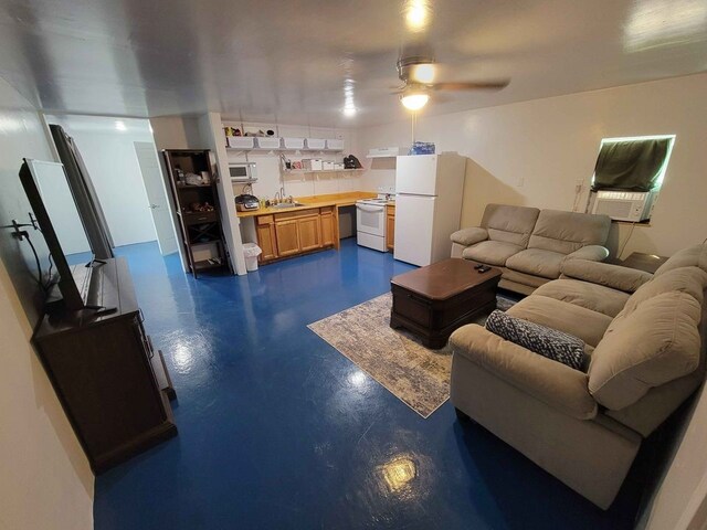 1502 S Hood St, Rockport, TX 78382 - living area featuring ceiling fan, concrete flooring, and cooling unit