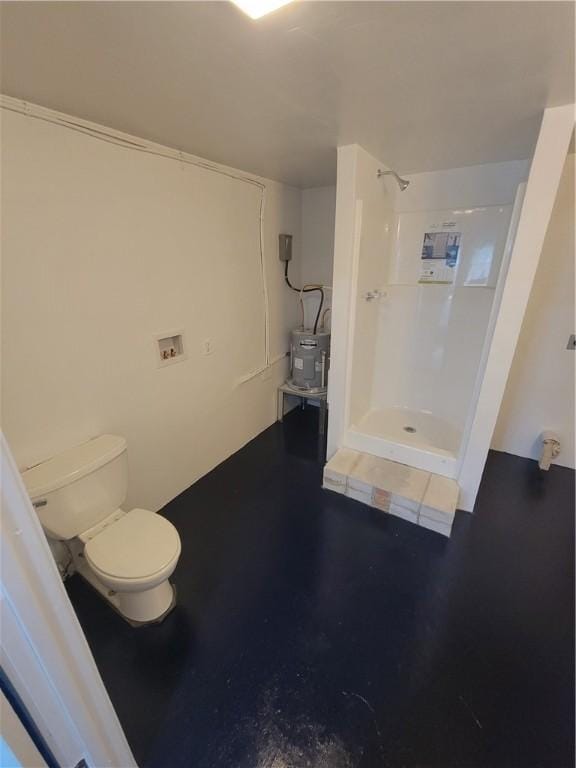 1502 S Hood St, Rockport, TX 78382 - bathroom with toilet and a shower stall