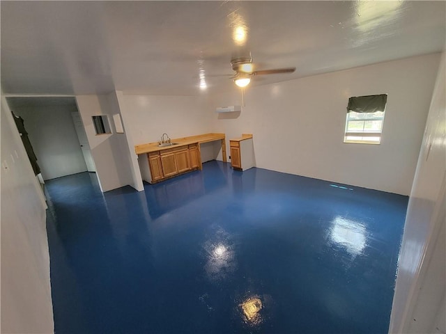 1502 S Hood St, Rockport, TX 78382 - unfurnished living room with finished concrete flooring and ceiling fan