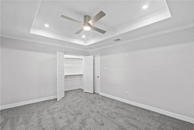 6417 Coral Gables Dr, Corpus Christi, TX 78413 - unfurnished bedroom featuring a tray ceiling, recessed lighting, carpet flooring, crown molding, and ceiling fan