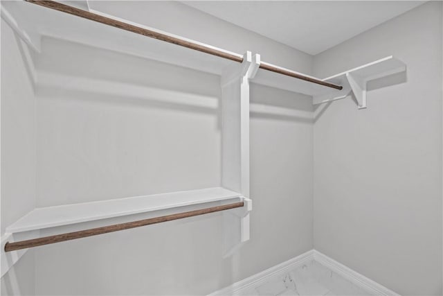 6417 Coral Gables Dr, Corpus Christi, TX 78413 - walk in closet featuring marble finish flooring