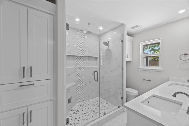 6417 Coral Gables Dr, Corpus Christi, TX 78413 - bathroom with marble finish floors, a marble finish shower, double vanity, and recessed lighting