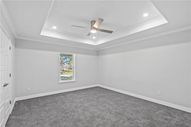 6417 Coral Gables Dr, Corpus Christi, TX 78413 - spare room with dark colored carpet, a raised ceiling, a ceiling fan, recessed lighting, and crown molding