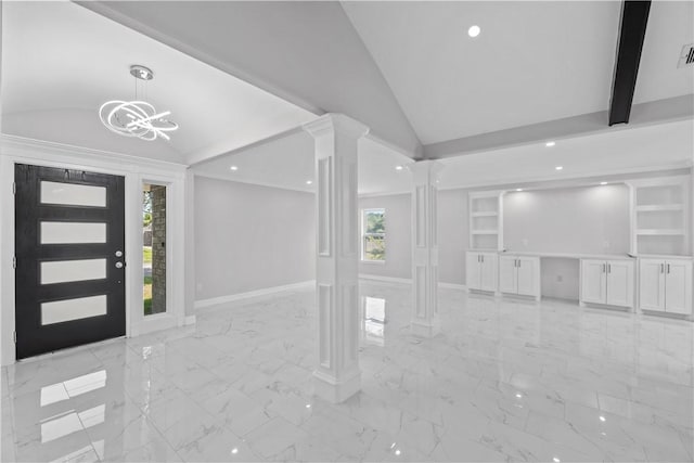 6417 Coral Gables Dr, Corpus Christi, TX 78413 - entryway with vaulted ceiling, ornate columns, light marble finish floors, healthy amount of natural light, and a chandelier