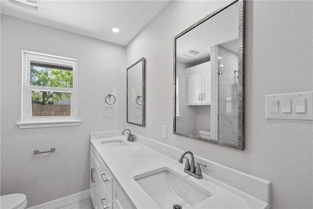 6417 Coral Gables Dr, Corpus Christi, TX 78413 - bathroom with double vanity and a shower