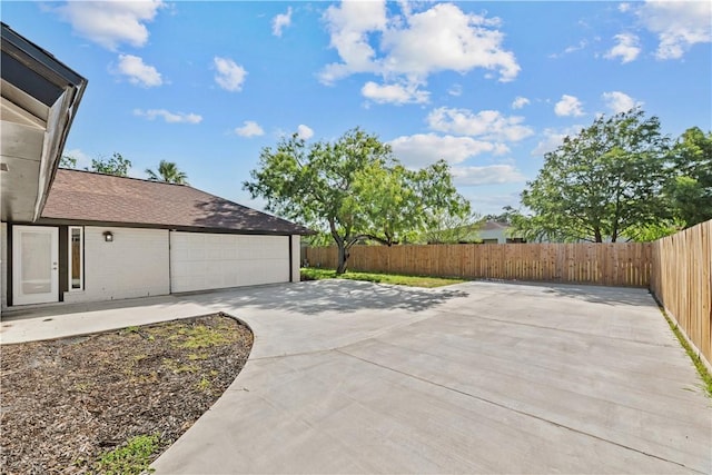 6417 Coral Gables Dr, Corpus Christi, TX 78413 - view of patio featuring a garage