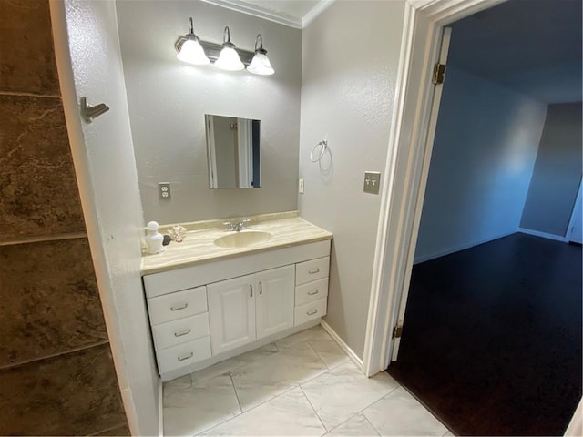 bathroom featuring vanity and crown molding