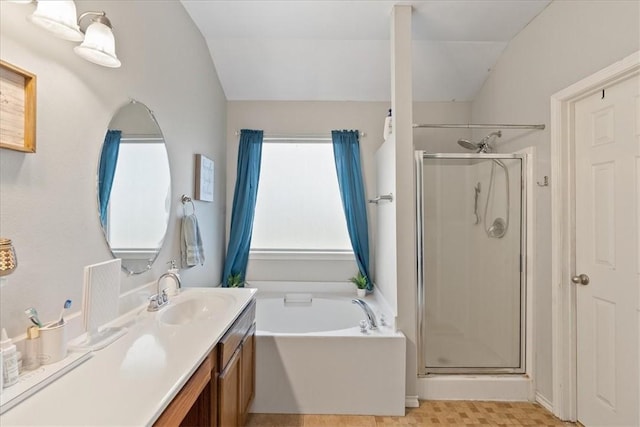 3901 Gibraltar Dr, Corpus Christi, TX 78414 - bathroom featuring a shower stall, a bath, vanity, and vaulted ceiling