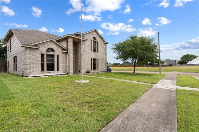 3901 Gibraltar Dr, Corpus Christi, TX 78414 - view of front facade with brick siding and roof with shingles
