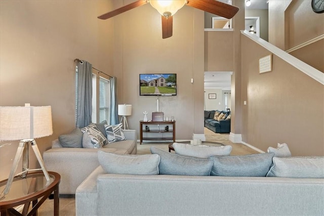 3901 Gibraltar Dr, Corpus Christi, TX 78414 - living area featuring a towering ceiling, a ceiling fan, and carpet floors
