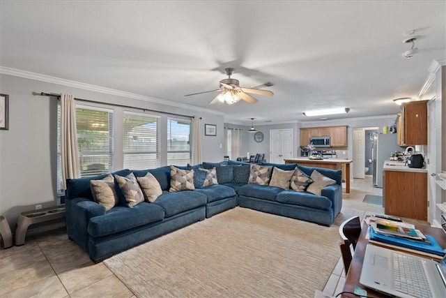 3901 Gibraltar Dr, Corpus Christi, TX 78414 - living area with crown molding, light tile patterned floors, and ceiling fan