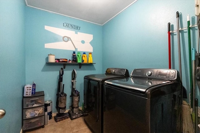 3901 Gibraltar Dr, Corpus Christi, TX 78414 - washroom featuring separate washer and dryer and tile patterned flooring