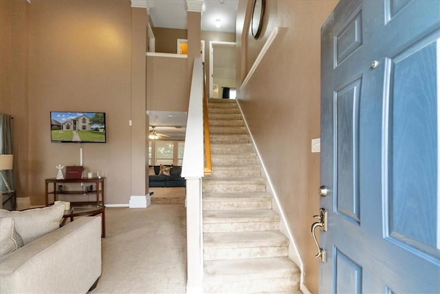 3901 Gibraltar Dr, Corpus Christi, TX 78414 - carpeted foyer entrance with stairway, baseboards, and ceiling fan