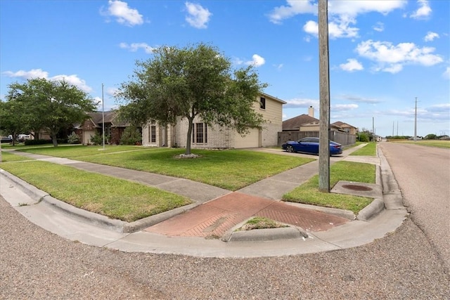3901 Gibraltar Dr, Corpus Christi, TX 78414 - view of property hidden behind natural elements featuring a front yard and driveway