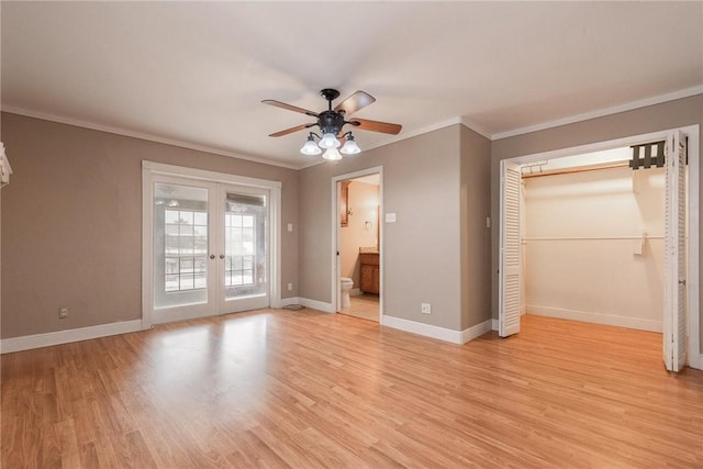 unfurnished bedroom featuring access to exterior, baseboards, french doors, ornamental molding, and light wood finished floors