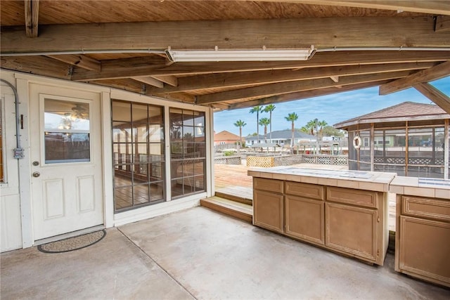 view of patio featuring fence