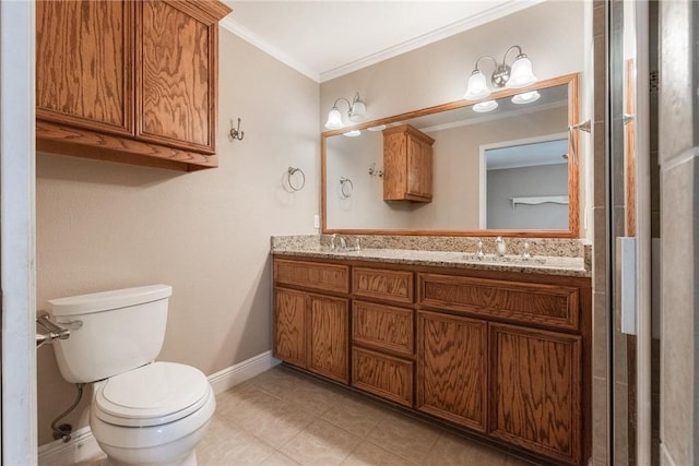 bathroom with tile patterned floors, a sink, toilet, and crown molding