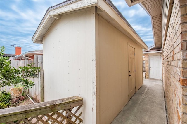 view of property exterior featuring fence