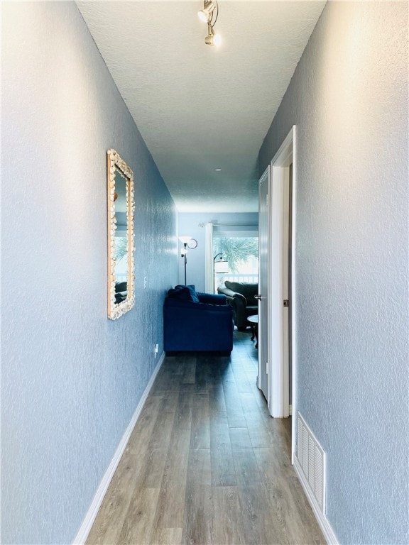 hall featuring light hardwood / wood-style floors