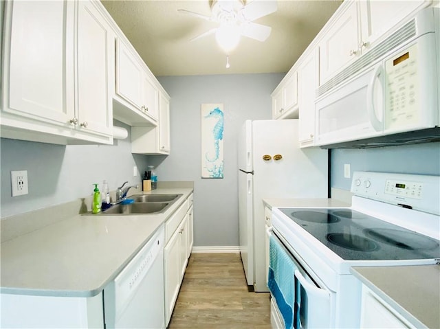 14428 Compass St Unit 204, Corpus Christi, TX 78418 - kitchen featuring white appliances, light wood-style flooring, white cabinets, ceiling fan, and light countertops