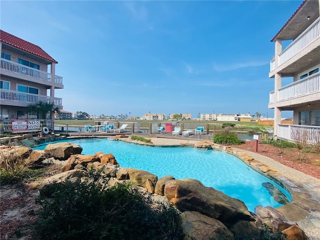 14428 Compass St Unit 204, Corpus Christi, TX 78418 - view of swimming pool with a patio area