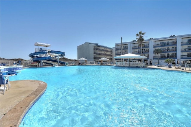 6317 State Highway 361 Unit 3307, Port Aransas, TX 78373 - community pool featuring a water slide