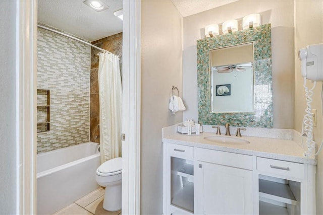 6317 State Highway 361 Unit 3307, Port Aransas, TX 78373 - full bathroom with toilet, vanity, shower / bath combination with curtain, tile patterned flooring, and a ceiling fan
