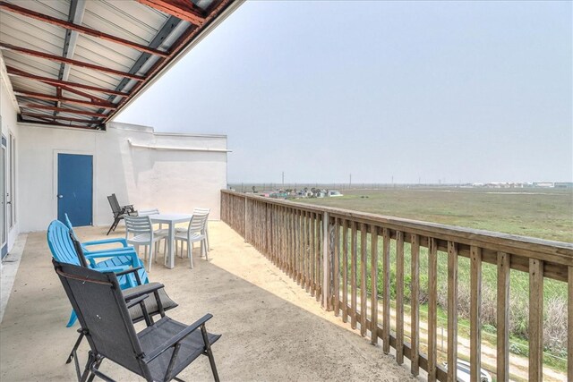 view of patio / terrace featuring a rural view