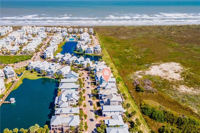 bird's eye view with a residential view and a water view